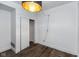 Simple bedroom with wood-look floors and a large closet at 108 E St Clair St # B, Indianapolis, IN 46204