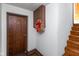 Building entry with stairs and a wreath on the door at 108 E St Clair St # B, Indianapolis, IN 46204