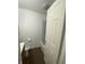 Bathroom with tub shower and wood flooring at 647 W Mcgregor Rd, Indianapolis, IN 46217