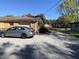 Gravel driveway and brick home exterior at 647 W Mcgregor Rd, Indianapolis, IN 46217