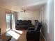 Living room with recliner sofas and hardwood floors at 647 W Mcgregor Rd, Indianapolis, IN 46217