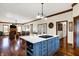 Open concept kitchen with island and Gathering room view at 7178 Lockford N, Avon, IN 46123