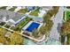 Community pool with a blue cover and surrounding residential area at 7178 Lockford N, Avon, IN 46123