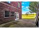 Brick home with a back patio and a view of the golf course at 7178 Lockford N, Avon, IN 46123