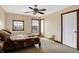 Cozy bedroom with wood floors and ceiling fan at 7178 Lockford N, Avon, IN 46123