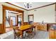 Bright dining room with hardwood floors and a wooden table at 7178 Lockford N, Avon, IN 46123