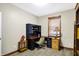 Bright home office featuring a corner desk and bookshelves at 7178 Lockford N, Avon, IN 46123