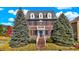 Brick two-story house with landscaping and a walkway at 7178 Lockford N, Avon, IN 46123