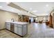 Open concept basement with a kitchen island and bar area at 7178 Lockford N, Avon, IN 46123