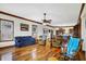 Spacious living room with hardwood floors, fireplace, and kitchen view at 7178 Lockford N, Avon, IN 46123