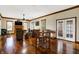 Bright living room featuring hardwood floors and French doors leading to a deck at 7178 Lockford N, Avon, IN 46123
