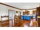 Kitchen features hardwood floors, island, and breakfast nook at 7178 Lockford N, Avon, IN 46123