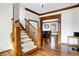 Wooden staircase with a classic design, leading to the upper level at 7178 Lockford N, Avon, IN 46123