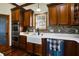 Modern kitchen featuring stainless steel appliances and a farmhouse sink at 7178 Lockford N, Avon, IN 46123