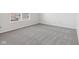 Simple bedroom with grey carpet and a window at 4633 Angelica Dr, Indianapolis, IN 46237
