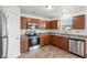 Kitchen with stainless steel appliances and granite countertops at 4633 Angelica Dr, Indianapolis, IN 46237