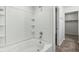 Bathroom with a shower/tub combo and built-in shelving at 4633 Angelica Dr, Indianapolis, IN 46237