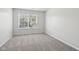 Bright bedroom with neutral walls and grey carpet at 4633 Angelica Dr, Indianapolis, IN 46237