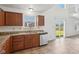 Kitchen with granite countertops and backyard access at 4633 Angelica Dr, Indianapolis, IN 46237