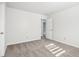 Spacious bedroom with grey carpet and access to upstairs at 4633 Angelica Dr, Indianapolis, IN 46237