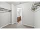 Walk-in closet with access to bathroom and double hanging rods at 4633 Angelica Dr, Indianapolis, IN 46237