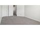 Spacious bedroom with grey carpet and double doors at 4633 Angelica Dr, Indianapolis, IN 46237
