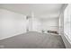Open loft area with grey carpet and a view to the lower floor at 4633 Angelica Dr, Indianapolis, IN 46237
