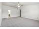 Main bedroom with ceiling fan and access to the bathroom at 4633 Angelica Dr, Indianapolis, IN 46237