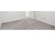 Empty bedroom with grey carpet and an open door at 4633 Angelica Dr, Indianapolis, IN 46237