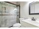 Bathroom with a walk-in shower, updated vanity, and modern fixtures at 10723 Chase Ct, Fishers, IN 46037