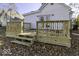 New deck with wooden railings overlooking backyard at 452 W Broadway St, Greenwood, IN 46142