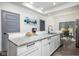 Modern kitchen with white cabinets, granite countertops and stainless steel appliances at 2221 E Michigan St, Indianapolis, IN 46201