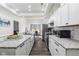 Modern kitchen featuring white cabinets, granite counters, and stainless steel appliances at 2221 E Michigan St, Indianapolis, IN 46201
