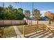 Spacious backyard with wooden deck and fence at 2221 E Michigan St, Indianapolis, IN 46201