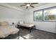 Bright bedroom with two twin beds and ample natural light at 2221 E Michigan St, Indianapolis, IN 46201