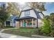 Newly renovated craftsman style home with a welcoming front porch at 2221 E Michigan St, Indianapolis, IN 46201