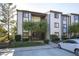 Two-story condo building with attractive landscaping and parking at 8168 Shorewalk Dr # A, Indianapolis, IN 46236