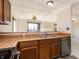 Bright kitchen features wood cabinets, stainless steel appliances, and a butcher block countertop at 8168 Shorewalk Dr # A, Indianapolis, IN 46236