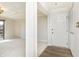 Bright entryway with white door and tin ceiling at 8168 Shorewalk Dr # A, Indianapolis, IN 46236
