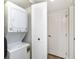 Stackable washer and dryer in a compact laundry room at 8168 Shorewalk Dr # A, Indianapolis, IN 46236