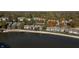 Community of homes located on a lake with fall foliage at 8168 Shorewalk Dr # A, Indianapolis, IN 46236