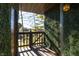 Private deck with artificial greenery and wooded views at 8168 Shorewalk Dr # A, Indianapolis, IN 46236