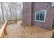 Wooden deck with brick home and autumn leaves at 808 Copperfield Xing, Danville, IN 46122