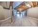 Unfinished basement with exposed beams and wood flooring at 808 Copperfield Xing, Danville, IN 46122