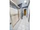 Bathroom with shower/tub combo and tiled floor at 808 Copperfield Xing, Danville, IN 46122