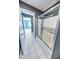 Bathroom with shower/tub combo and tiled floor at 808 Copperfield Xing, Danville, IN 46122