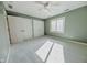 Bedroom with carpet flooring, window, and ceiling fan at 808 Copperfield Xing, Danville, IN 46122