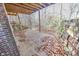 Wooden deck with autumn leaves, offering a secluded wooded view at 808 Copperfield Xing, Danville, IN 46122