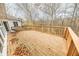 Spacious deck overlooking a wooded area, showcasing a tranquil setting at 808 Copperfield Xing, Danville, IN 46122