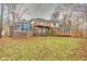 Home with a large deck, sunroom, and backyard at 808 Copperfield Xing, Danville, IN 46122